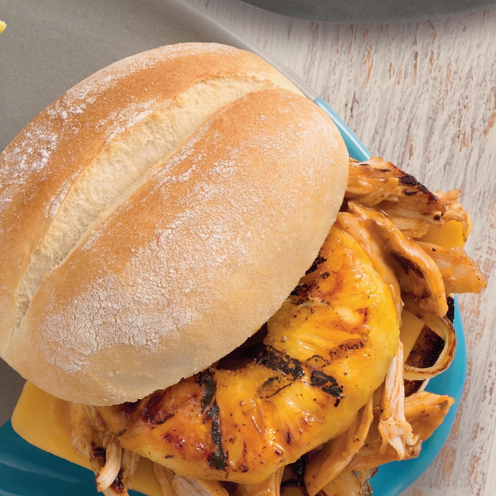 Picture of Pulled Chicken & Cheese Burger with Pineapple
